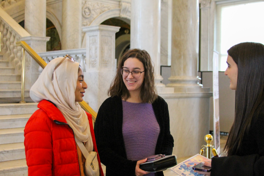 Three students speaking in an official DC building